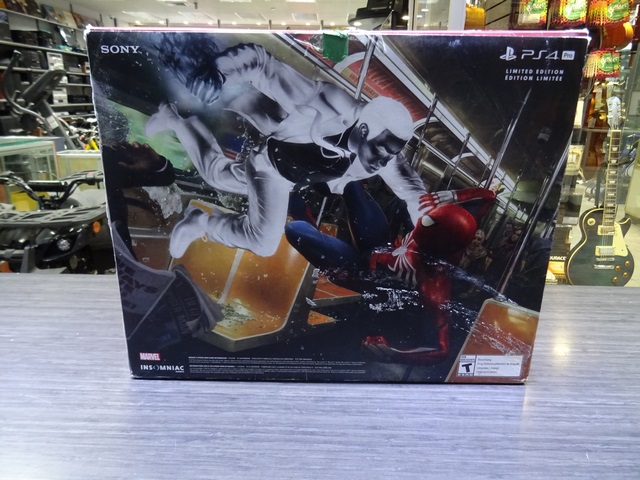 Console PS4 pro etition Spider Man 1to (complet en boite) - Image 4