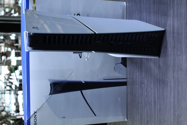 Console PS5 slim 1to + lecteur cd + chargeur a manette + acc - Image 2