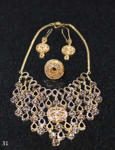 Ensemble 32 Bijoux en or (Bague + B.O. + collier ) Or jaunes (21k-50.1g)