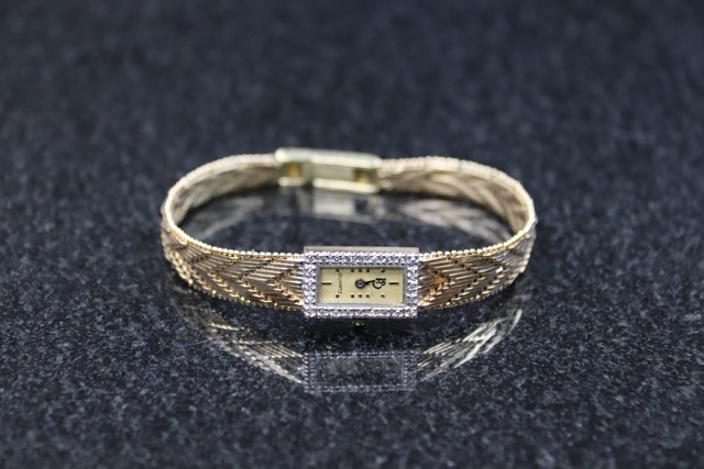 Montre de Qualité 11 Montre en or (PB DIAMANT) Or jaunes (14k-25.2g)